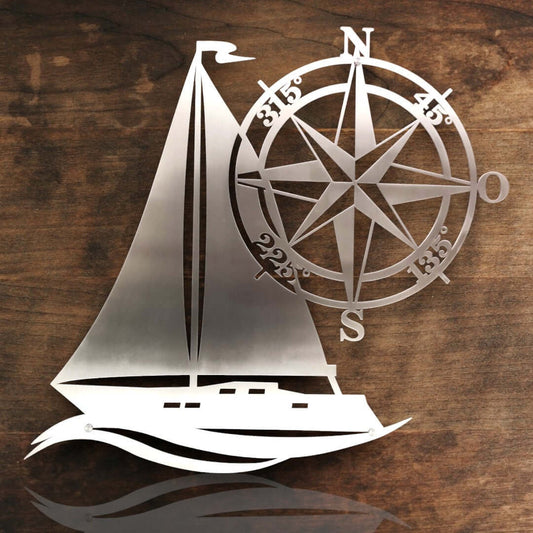 maritime edelstahl wanddeko Segelschiff mit kompass vor einer holzwand